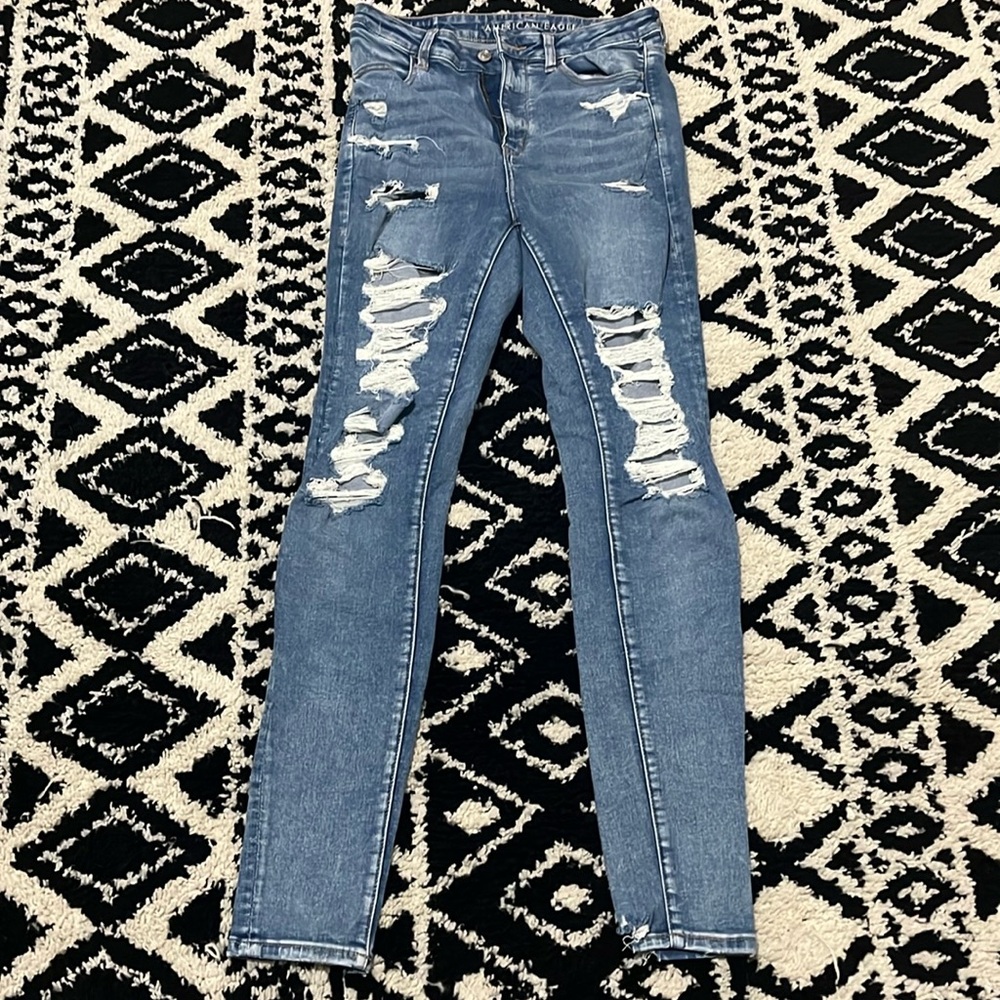 Next level stretch by American Eagle. No stains, barely worn.